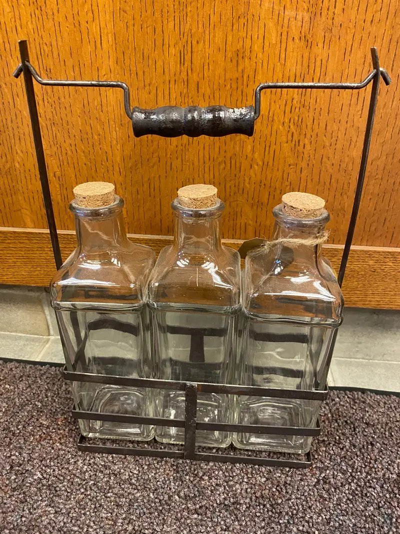 Set Of Three Decorative Glass Bottles With Metal Counter Display Stand 1